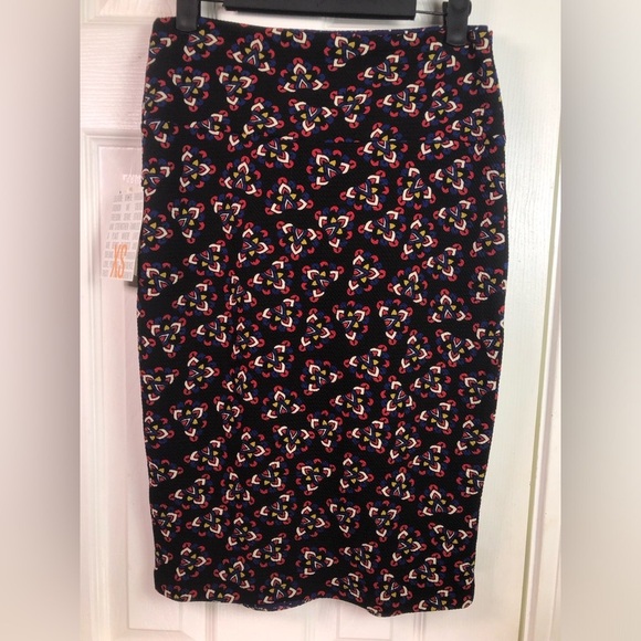 LuLaRoe Dresses & Skirts - LuLaRoe Black Pencil Skirt with Multi-Color Heart Motif